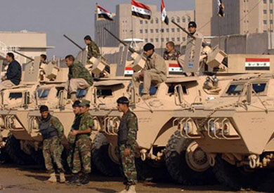 تواجد قوات الامن العراقية فى أحد الشوارع ارشيفية